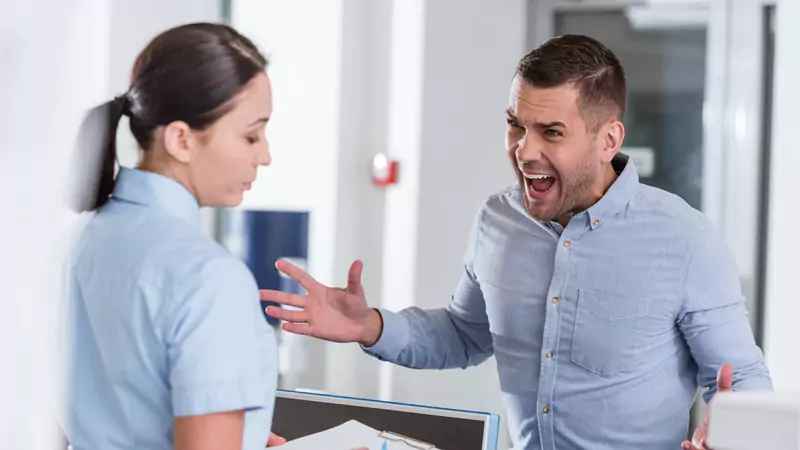 angry-patient-yelling-at-nurse-after-self-diagnosing-with-google-health-information
